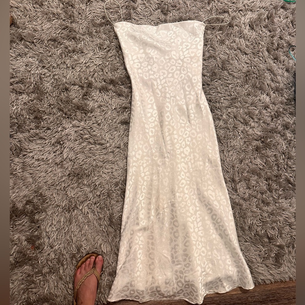 White silk dress from a boutique